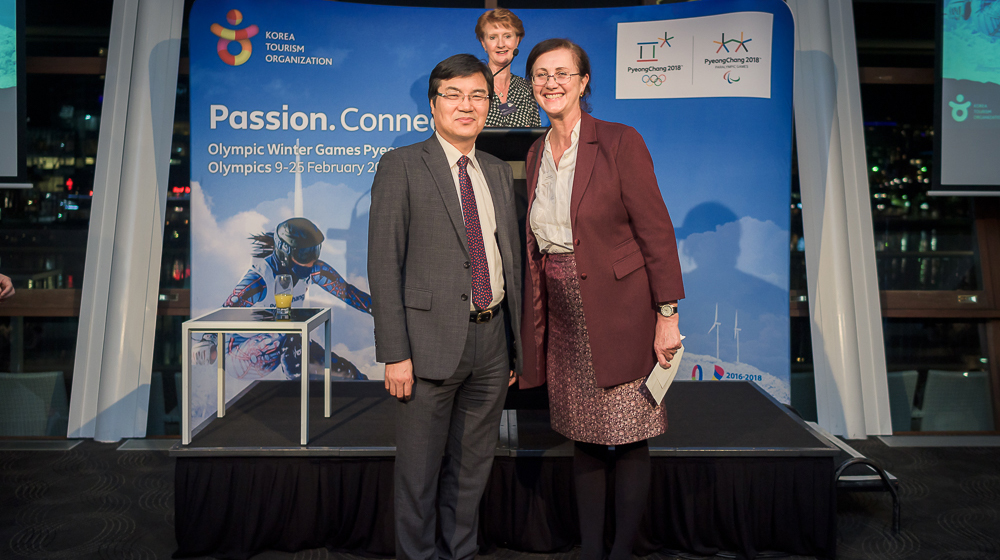 Grace Lech of Grace Club Travel, winner of Korean Air prize, with KE Director, Sung Hoon Ka