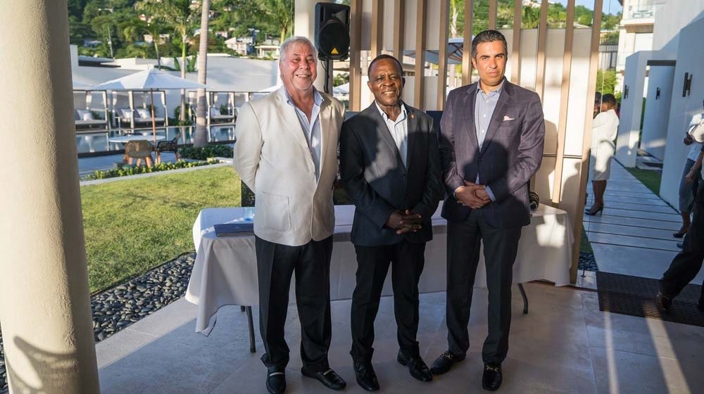 Dr Keith Mitchell, Prime Minister of Grenada (centre); with Kamal Shehada (left) and Mohammed Asaria (right), Joint Managing Directors of Range Developments.