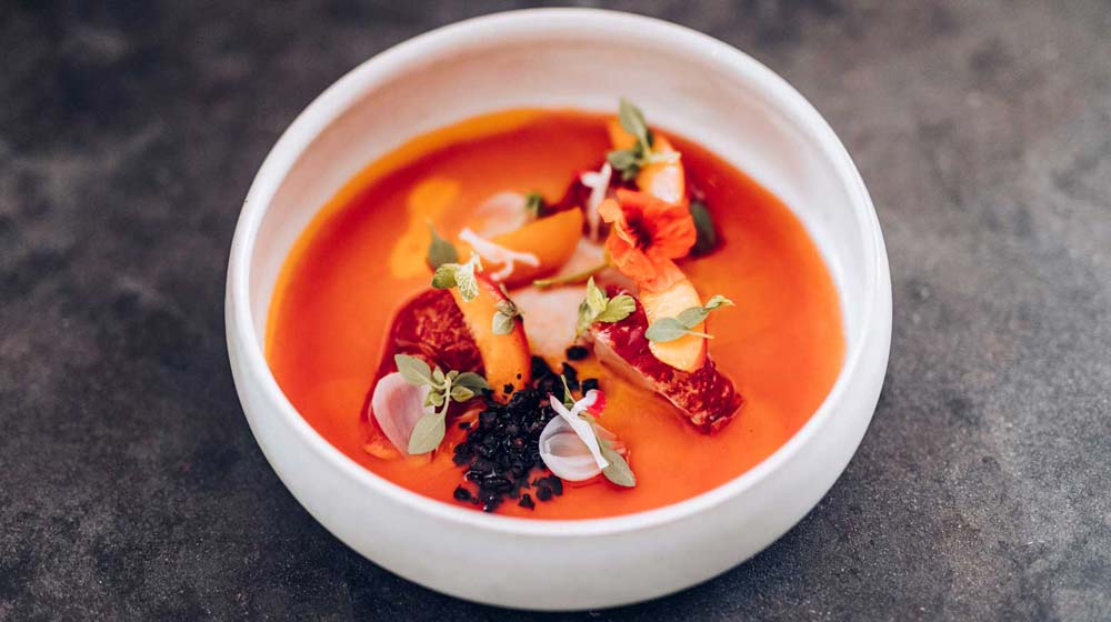 Blue lobster with apricot at Saturne, Paris, France | Image Credit: Jerome Galland